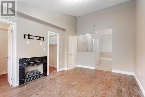 26 - 8 Brighton Place, Vaughan, ON - Indoor With Fireplace