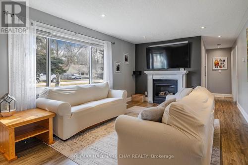 104 Bass Line, Orillia, ON - Indoor Photo Showing Living Room With Fireplace