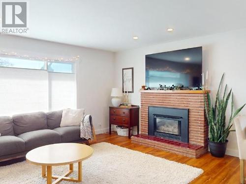 6883 Hammond Street, Powell River, BC - Indoor Photo Showing Living Room With Fireplace
