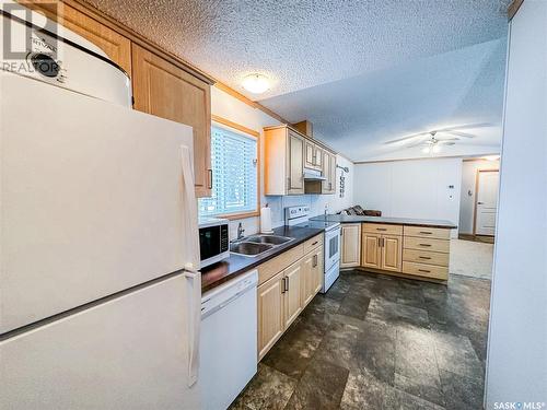 2 Obenauer Drive, Melville Beach, SK - Indoor Photo Showing Kitchen With Double Sink