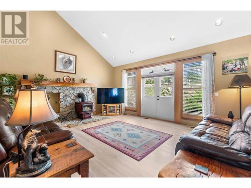 305 Tanager Drive, Kelowna, BC - Indoor Photo Showing Living Room With Fireplace