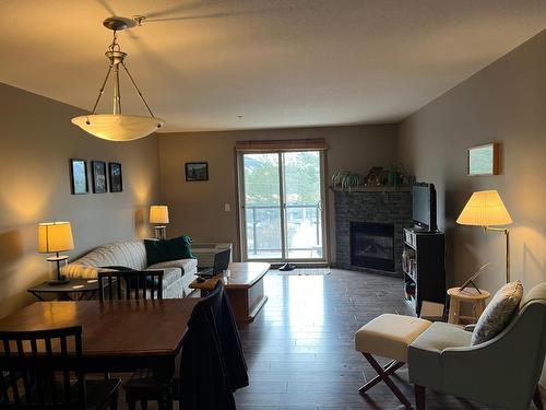 308 - 4874 Stanley Street, Radium Hot Springs, BC - Indoor With Fireplace
