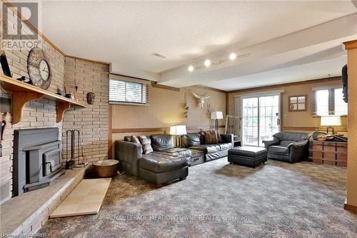 225/269 Campbell Ave E, Milton, ON - Indoor Photo Showing Living Room With Fireplace