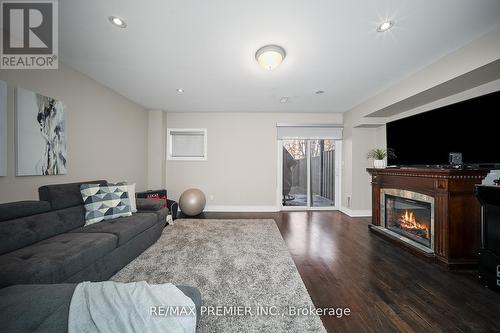5 - 8032 Kipling Avenue, Vaughan, ON - Indoor Photo Showing Living Room With Fireplace