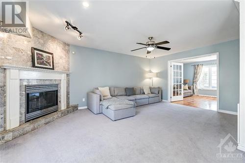 6 Hartsmere Drive, Ottawa, ON - Indoor Photo Showing Living Room With Fireplace