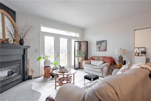5200 Dorchester Road|Unit #21, Niagara Falls, ON - Indoor Photo Showing Living Room With Fireplace