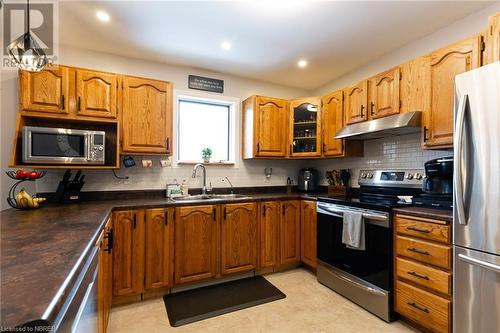 412 Old Ferguson Road, Laurier, ON - Indoor Photo Showing Kitchen With Double Sink
