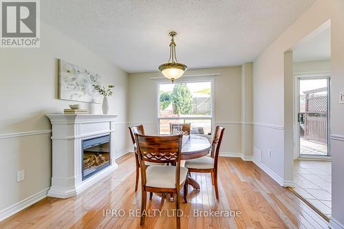 50 Merritt Cres, Grimsby, ON - Indoor Photo Showing Dining Room With Fireplace