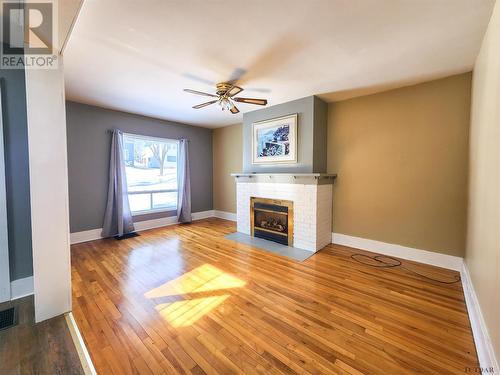133 Buckingham Ave, Iroquois Falls, ON - Indoor Photo Showing Living Room With Fireplace