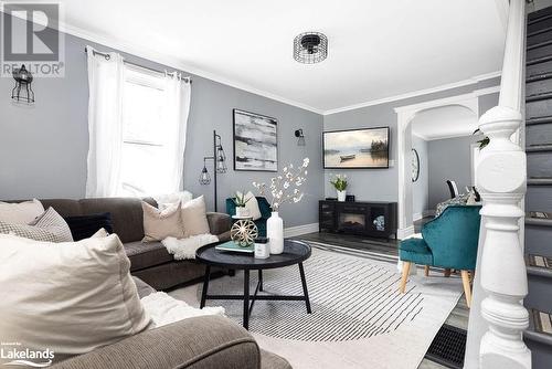 57 Woodward Street, Bracebridge, ON - Indoor Photo Showing Living Room With Fireplace