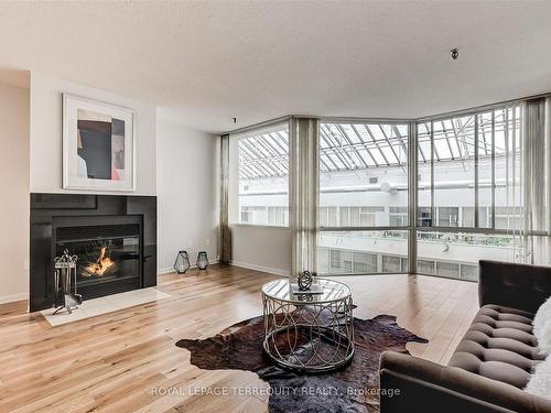 806-71 Front St E, Toronto, ON - Indoor Photo Showing Living Room With Fireplace