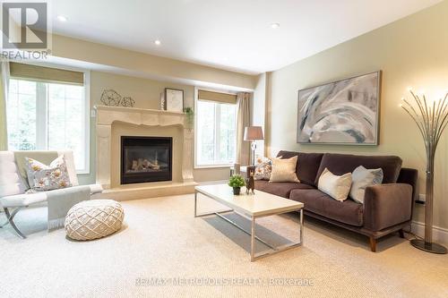 #1 -301 Crossing Bridge Pl, Aurora, ON - Indoor Photo Showing Living Room With Fireplace