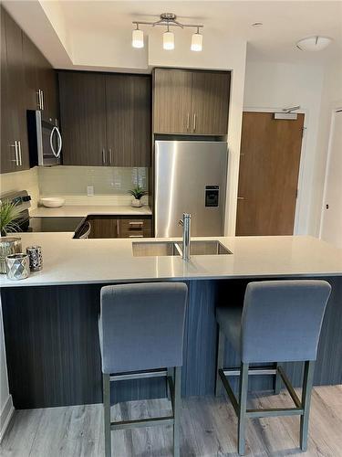340 Plains Road E|Unit #207, Burlington, ON - Indoor Photo Showing Kitchen With Stainless Steel Kitchen With Double Sink With Upgraded Kitchen