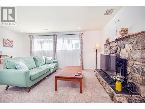 965 Manhattan Drive, Kelowna, BC - Indoor Photo Showing Living Room With Fireplace