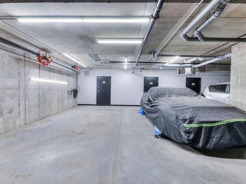 Garage - 412-14415 Rue Roger-Thomas, Mirabel, QC - Indoor Photo Showing Garage