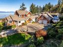 6344 Coho Dr, Courtenay, BC  - Outdoor With Body Of Water With Facade 