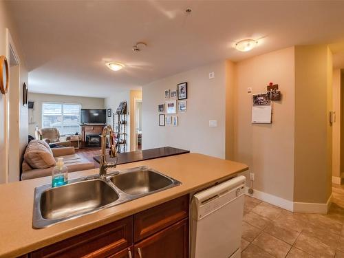 104-256 Hastings Street, Penticton, BC - Indoor Photo Showing Kitchen With Double Sink
