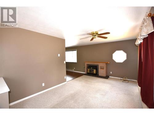 335 Deer Street, Vernon, BC - Indoor Photo Showing Other Room With Fireplace