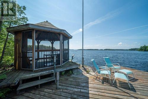 2475 Alfs Bay Lane E, Central Frontenac, ON - Outdoor With Body Of Water With Deck Patio Veranda