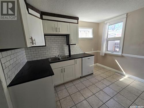 209 K Avenue S, Saskatoon, SK - Indoor Photo Showing Kitchen With Double Sink