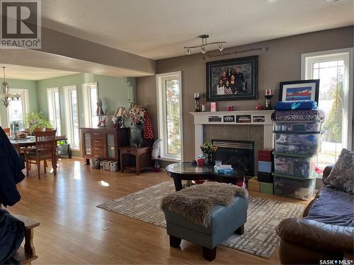 28 Telfer Bay, Prince Albert, SK - Indoor Photo Showing Living Room With Fireplace