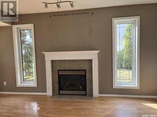 28 Telfer Bay, Prince Albert, SK - Indoor Photo Showing Living Room With Fireplace