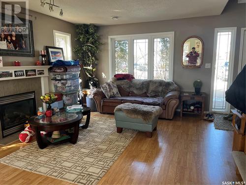 28 Telfer Bay, Prince Albert, SK - Indoor Photo Showing Living Room With Fireplace