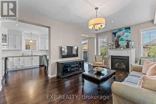 4421 Saw Mill Dr, Niagara Falls, ON - Indoor Photo Showing Living Room With Fireplace