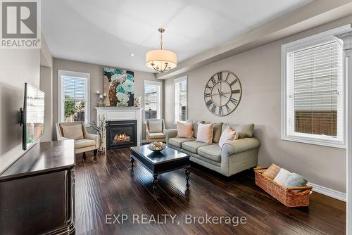 4421 Saw Mill Dr, Niagara Falls, ON - Indoor Photo Showing Living Room With Fireplace