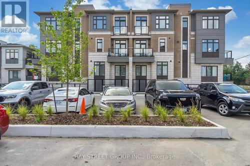 313 - 10 Halliford Place, Brampton, ON - Outdoor With Facade