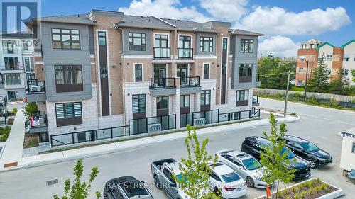 313 - 10 Halliford Place, Brampton, ON - Outdoor With Facade