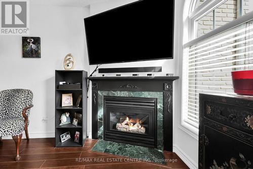 #201 -970 Golf Links Rd, Hamilton, ON - Indoor Photo Showing Living Room With Fireplace