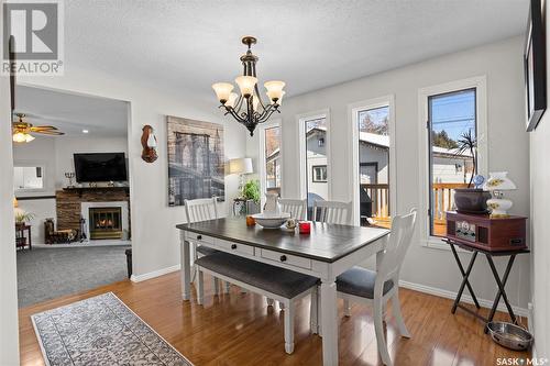 2611 Cumberland Avenue S, Saskatoon, SK - Indoor Photo Showing Dining Room With Fireplace