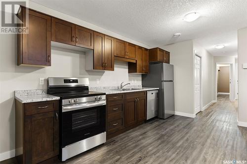 108 Osler Street, Regina, SK - Indoor Photo Showing Kitchen With Double Sink