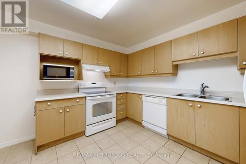 302 - 25 George Street, Toronto, ON - Indoor Photo Showing Kitchen With Double Sink