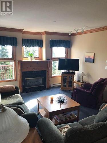 357 Monashee Road Road Unit# 301, Silver Star, BC - Indoor Photo Showing Living Room With Fireplace