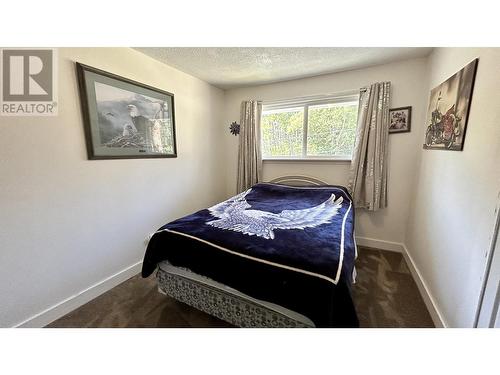 5003 Smith Road, 108 Mile Ranch, BC - Indoor Photo Showing Bedroom