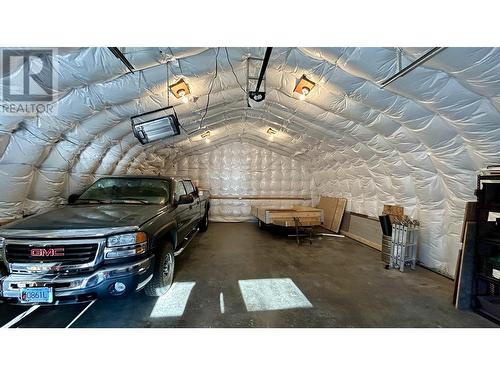 5003 Smith Road, 108 Mile Ranch, BC - Indoor Photo Showing Garage