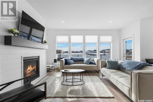 904 Feheregyhazi Boulevard, Saskatoon, SK - Indoor Photo Showing Living Room With Fireplace