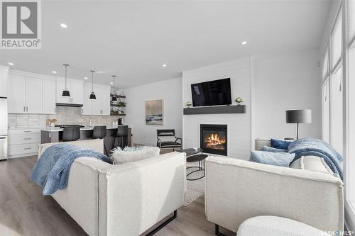904 Feheregyhazi Boulevard, Saskatoon, SK - Indoor Photo Showing Living Room With Fireplace