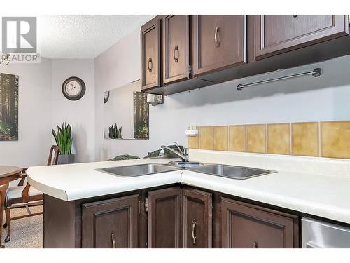 983 Bernard Avenue Unit# 211, Kelowna, BC - Indoor Photo Showing Kitchen With Double Sink