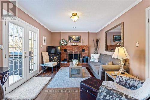 48 Elderwood Dr, St. Catharines, ON - Indoor Photo Showing Living Room With Fireplace