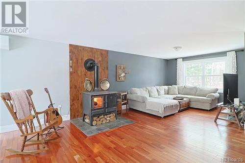 497 Route 628, Penniac, NB - Indoor Photo Showing Living Room With Fireplace