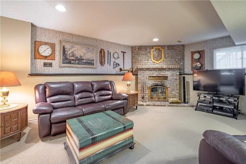 20 Peel Street, St. Catharines, ON - Indoor Photo Showing Living Room With Fireplace