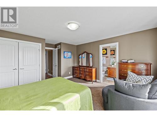 215 Poonian Street, Kelowna, BC - Indoor Photo Showing Bedroom