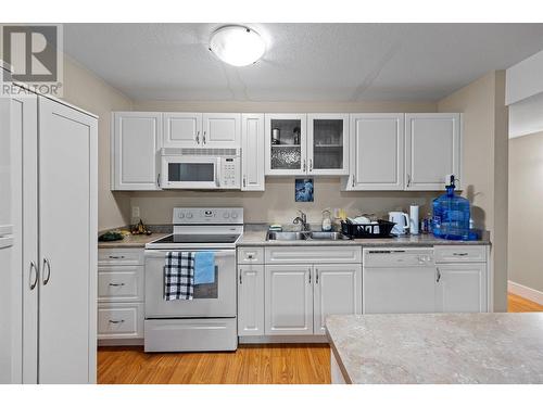 215 Poonian Street, Kelowna, BC - Indoor Photo Showing Kitchen With Double Sink