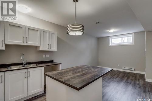 133 E Avenue S, Saskatoon, SK - Indoor Photo Showing Kitchen With Double Sink