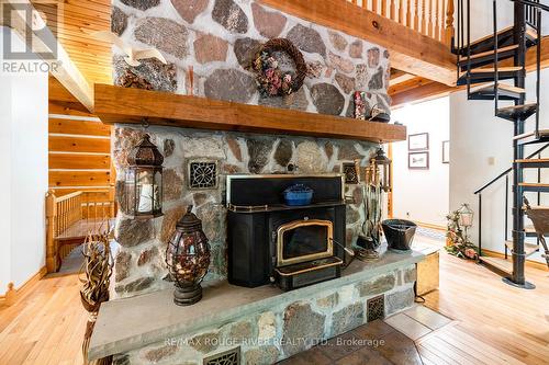 575 Golf Course Rd, Douro-Dummer, ON - Indoor Photo Showing Other Room With Fireplace