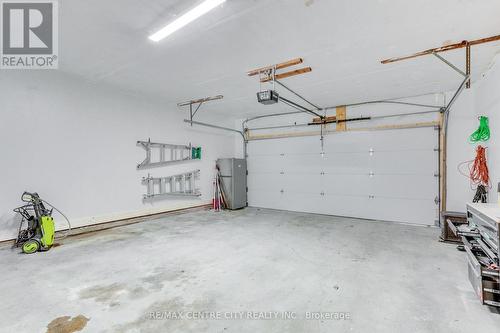 23 Chaucer Crt, London, ON - Indoor Photo Showing Garage