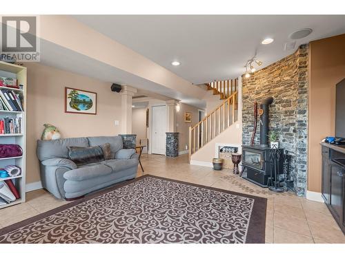 7344 Longacre Drive, Vernon, BC - Indoor Photo Showing Living Room With Fireplace